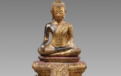 A Ratanakosin gilded and lacquered bronze figure of Buddha Shakyamuni. Thailand. 19th century