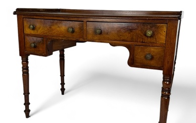 A Regency mahogany dressing table The rectangular top...