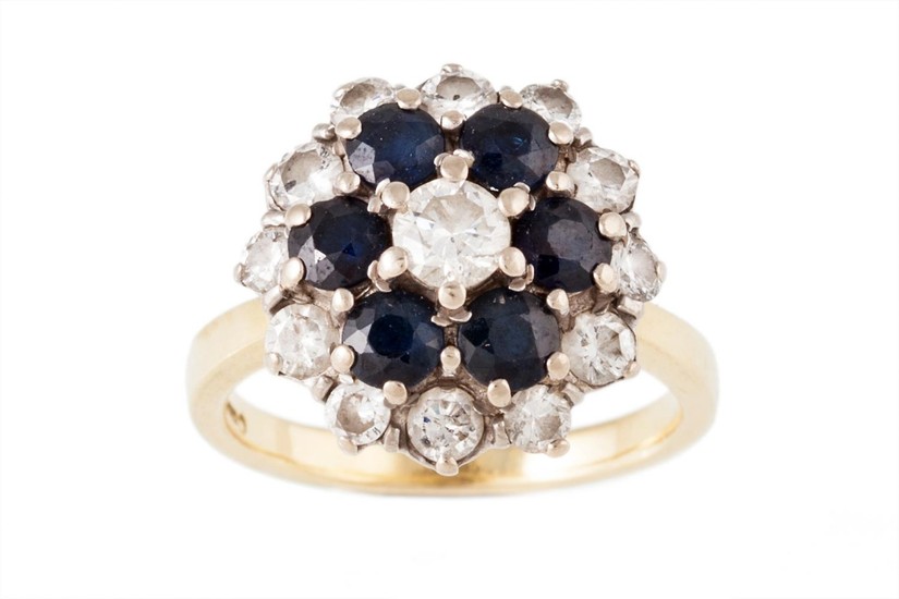 A SAPPHIRE AND DIAMOND CLUSTER RING, with sapphire of approx...