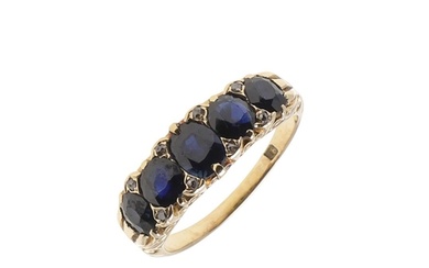 A SAPPHIRE AND DIAMOND FIVE STONE RING. the five oval-shaped...