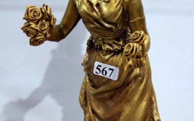 A SPELTER GILT FIGURE OF A NOBLE LADY