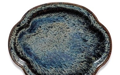 A Shiwan-style quatre-lobed shallow dish Qing dynasty, 19th century | 清十九世紀 石灣式仿鈞藍釉海棠式盤