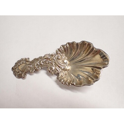 A Victorian silver Caddy Spoon formed as scallop shell with ...