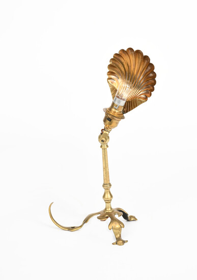 A brass table or wall light