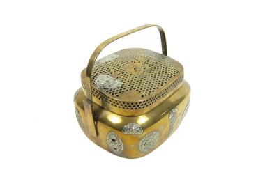 A bronze hand warmer with reticulated cover