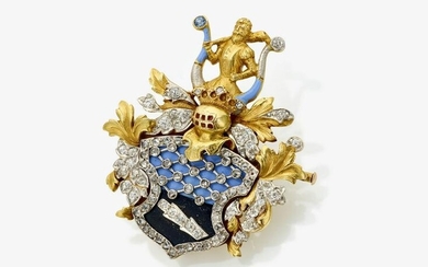 A brooch in the shape of a coat of arms with crest