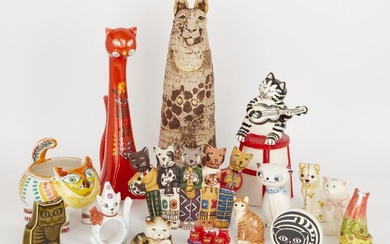 A collection of ceramics salts and pepper shakers modelled as cats, tallest 33.5cm, together with a studio pottery cat cookie jar and cover, a Taste Seller by Sigma jar and cover, a Face Pots 'Miss Marple's Cat' trinket box and cover, edition no...