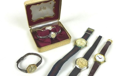 A collection of six retro watches, including an Ingersoll Tr...