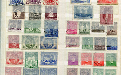 A collection of world used stamps in twenty stock books, including British Commonwealth, Ascension