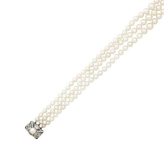 A cultured pearl necklace with diamond clasp