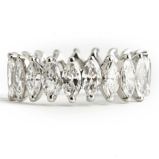 A diamond eternity ring set with numerous marquise-cut diamonds weighing a total of app. 4.20 ct., mounted in 18k white gold. G/VS. App. size 55.