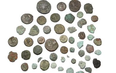 A group of Roman to Byzantine bronze coins, 2nd-10th century AD Provenance:...