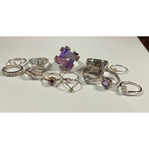 A group of thirteen silver and other rings