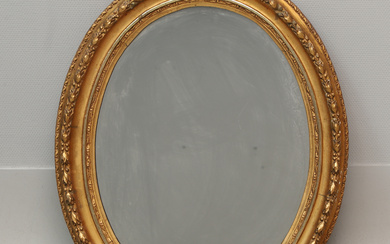 A mirror, oval, gilt frame, late Gustavian style, 18th/20th century.