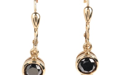 A pair of 9ct gold black diamond drop earrings, set with mod...