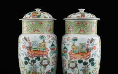 A pair of Chinese famille rose 'hundred antiques' lidded jars, late 19th century
