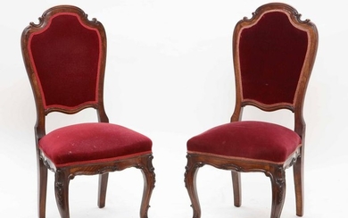 A pair of Rococo style walnut side chairs