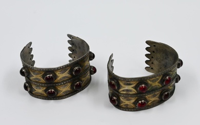 A pair of bracelets made of silver with gilding...