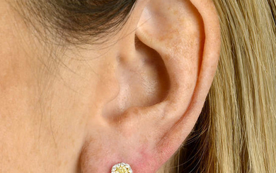 A pair of cushion-shape 'yellow' diamond and brilliant-cut diamond cluster earrings.