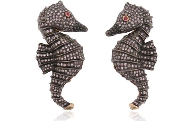 A pair of diamond-set seahorse earrings, pavè-set with single-cut diamonds...