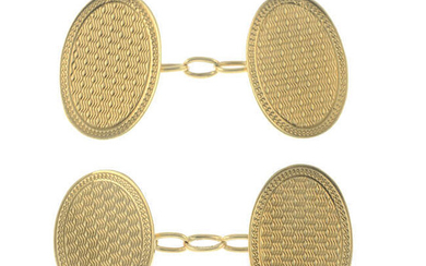 A pair of early 20th century 9ct gold textured cufflinks.