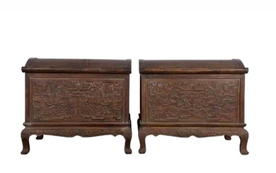 A pair of hardwood carved leather suitcases