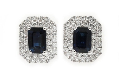 SOLD. A pair of sapphire and diamond ear studs each set with a sapphire encircled by numerous diamonds, mounted in 18k white gold. (2) – Bruun Rasmussen Auctioneers of Fine Art