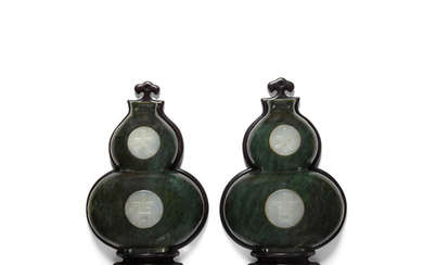 A pair of spinach jade 'double-gourd' wall hangings inlaid with white jade plaques