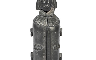 A pewter miniature model of an Iron Maiden, circa 1900. The model of the legendary torture instrument that was exhibited in Nuremberg until 1945 and destroyed in the Second World War. The hollow body with two hinged doors studded with nails to the...