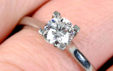 A platinum brilliant-cut diamond single-stone ring.