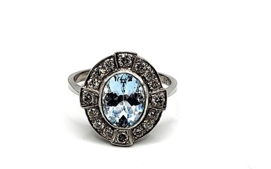 A platinum, diamond, and aquamarine ring, set with a mixed o...