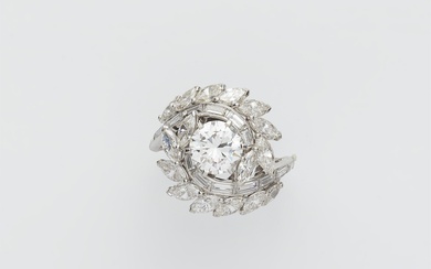 A platinum diamond swirl ring with a ca. 1.50 ct brilliant-cut diamond solitaire.