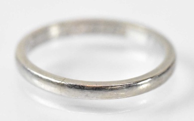 A platinum wedding band, marked 'Plat 0295' to the inside,...