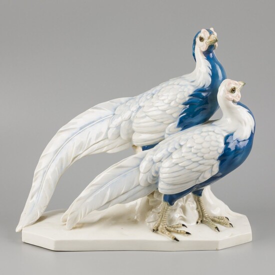 A porcelain sculpture group of a pair of gold pheasants, marked Passau, Germany, circa 1930....