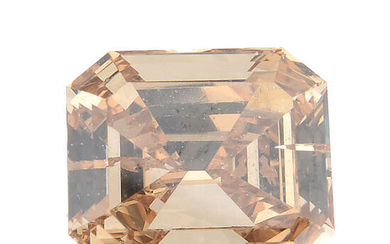 A rectangular-shape 'brown' diamond, weighing 0.59ct.