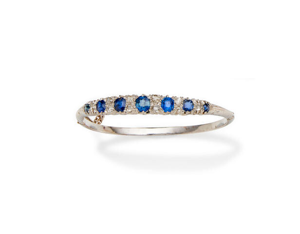 A sapphire and diamond hinged bangle