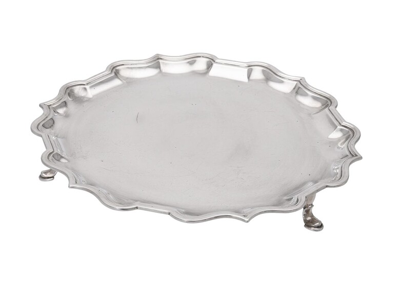 A silver shaped circular salver by C. S. Harris Ltd