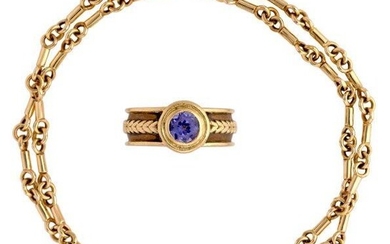 An 18-carat gold ring and neck chain, by Theo Fennell, the ring collet set with a circular-cut tanzanite, signed Fennell, British hallmarks for 18-carat gold, London 1995, ring size F 1/5. the chain of bar link design, maker's mark and British...