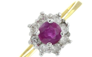 An 18ct gold ruby and diamond cluster ring.