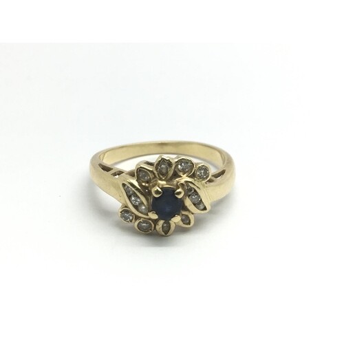 An 18ct gold sapphire and diamond ring, approx 3.4g and appr...