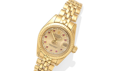 An 18k gold and ruby 'datejust' wristwatch