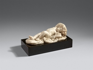 An 18th century marble figure of a sleeping p ...