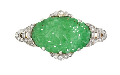 An Art Deco Jade and Diamond Brooch the oval pierced...
