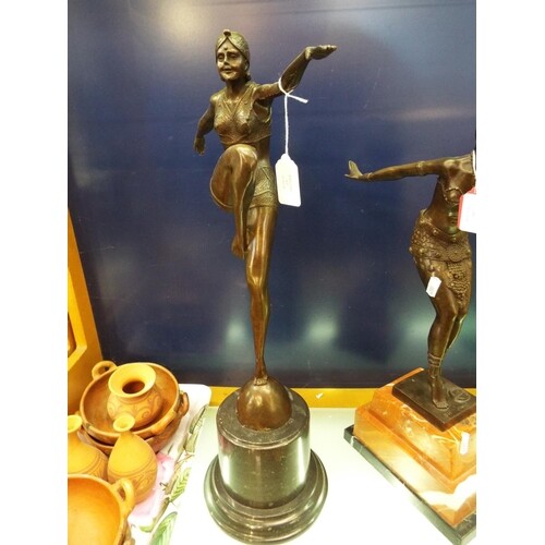 An Art Deco bronze figurine of a dancer resting on a marble ...