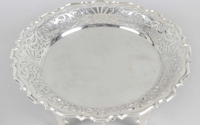An Edwardian pierced silver dish on four feet by Walker & Hall.