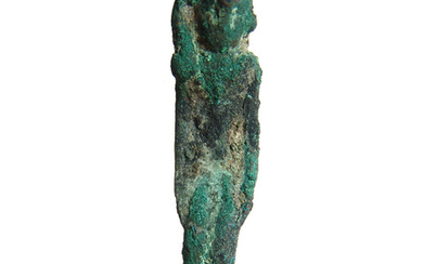 An Egyptian bronze seated amulet of Harpokrates