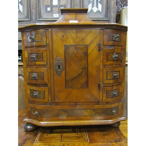 An antique walnut veneered table cabinet Austrian/possibly G...