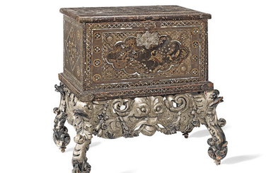 An early 17th century Japanese export mother of pearl inlaid lacquer 'Namban' chest on a Dutch 17th century or Charles II carved silvered stand
