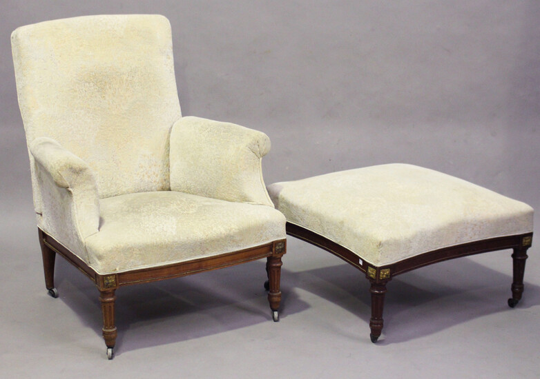 An early/mid-20th century French walnut framed reclining armchair with gilt metal mounts and fluted