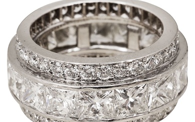 An impressive triple full hoop diamond-set eternity ring